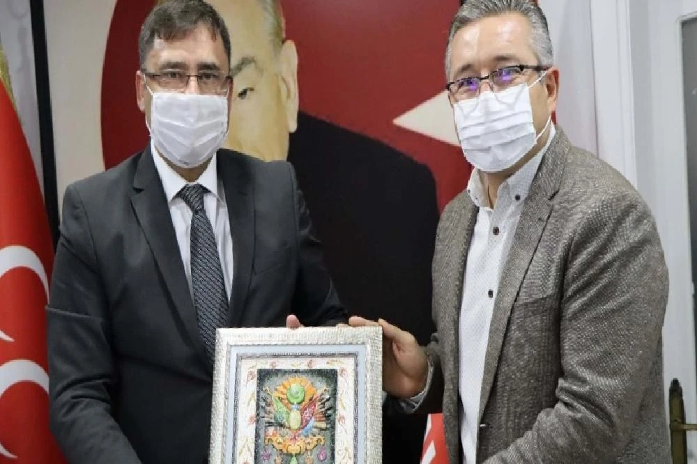 Kuşadası MHP’ye AK Parti İlçe Yönetiminden İadeyi Ziyaret